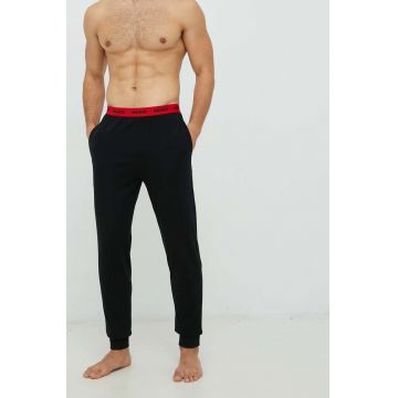 HUGO pantaloni de pijama bărbați, culoarea negru, uni 50480236