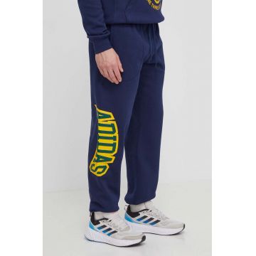 adidas Originals pantaloni de trening culoarea bleumarin, cu imprimeu IS0196