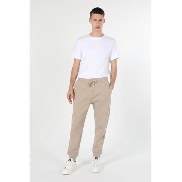 Pantaloni de trening cu snur de ajustare