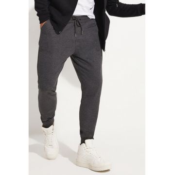 Pantaloni de trening cu buzunare oblice