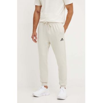 adidas pantaloni de trening Essentials culoarea bej, neted, JH1039