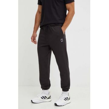 Puma pantaloni de trening din bumbac culoarea negru, neted, 627595