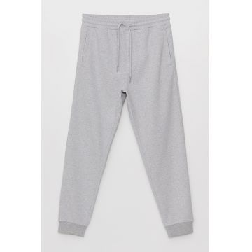 Pantaloni de trening conici cu buzunare oblice