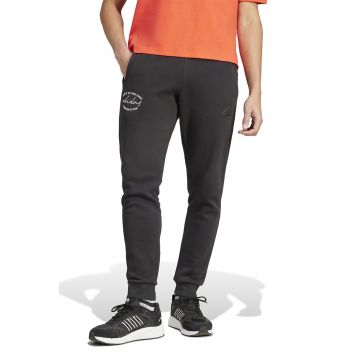 Pantaloni de trening cu talie elastica si buzunare laterale