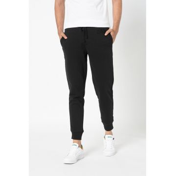 Pantaloni sport conici cu buzunare oblice