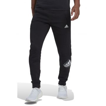 Pantaloni sport din amestec de bumbac cu buzunare cu fermoar