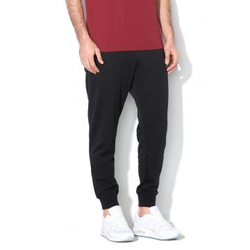 Pantaloni de trening conici cu buzunare laterale Sportswear Club