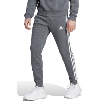 Pantaloni de trening conici cu buzunare laterale