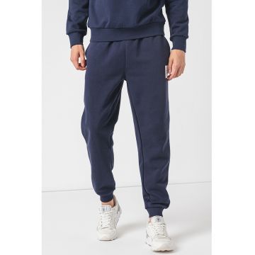 Pantaloni de trening conici cu buzunare oblice