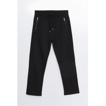 Pantaloni de trening cu buzunare cu fermoar