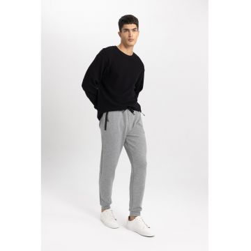 Pantaloni de trening cu buzunare cu fermoar