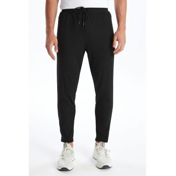 Pantaloni de trening slim fit cu buzunare cu fermoar