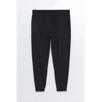 Pantaloni de trening cu buzunare oblice