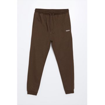 Pantaloni de trening cu buzunare laterale