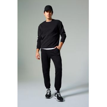 Pantaloni de trening cu croiala conica