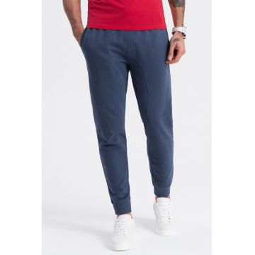 Pantaloni de trening cu croiala conica si snur de ajustare