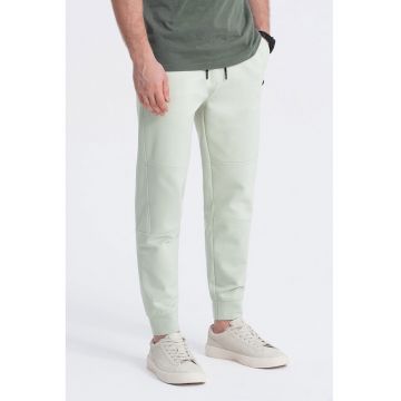 Pantaloni de trening cu buzunare cu fermoar