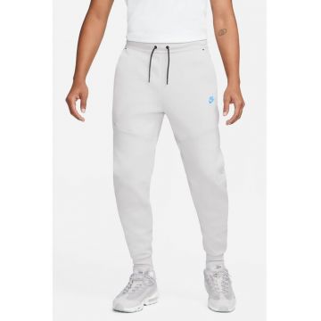 Pantaloni de trening cu croiala conica si snur de ajustare