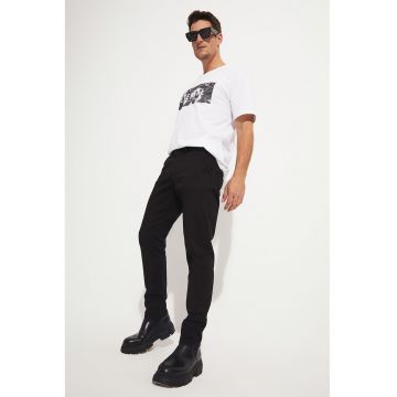 Pantaloni slim fit din amestec de bumbac