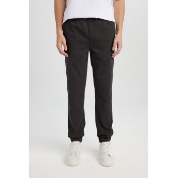 Pantaloni regular-fit cu terminatie elastica