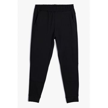 Pantaloni conici de trening cu talie elastica