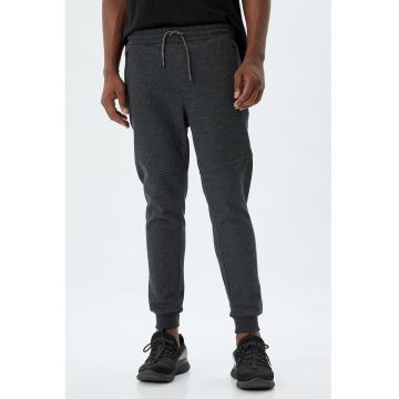 Pantaloni de trening cu buzunare cu fermoar