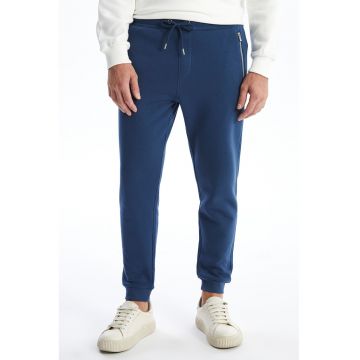 Pantaloni de trening cu buzunare cu fermoar