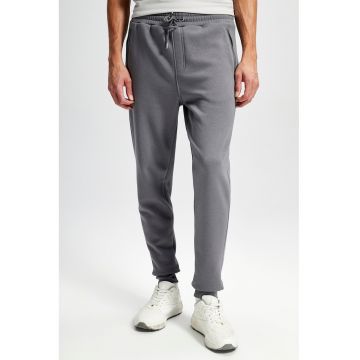 Pantaloni de trening cu buzunare cu fermoar